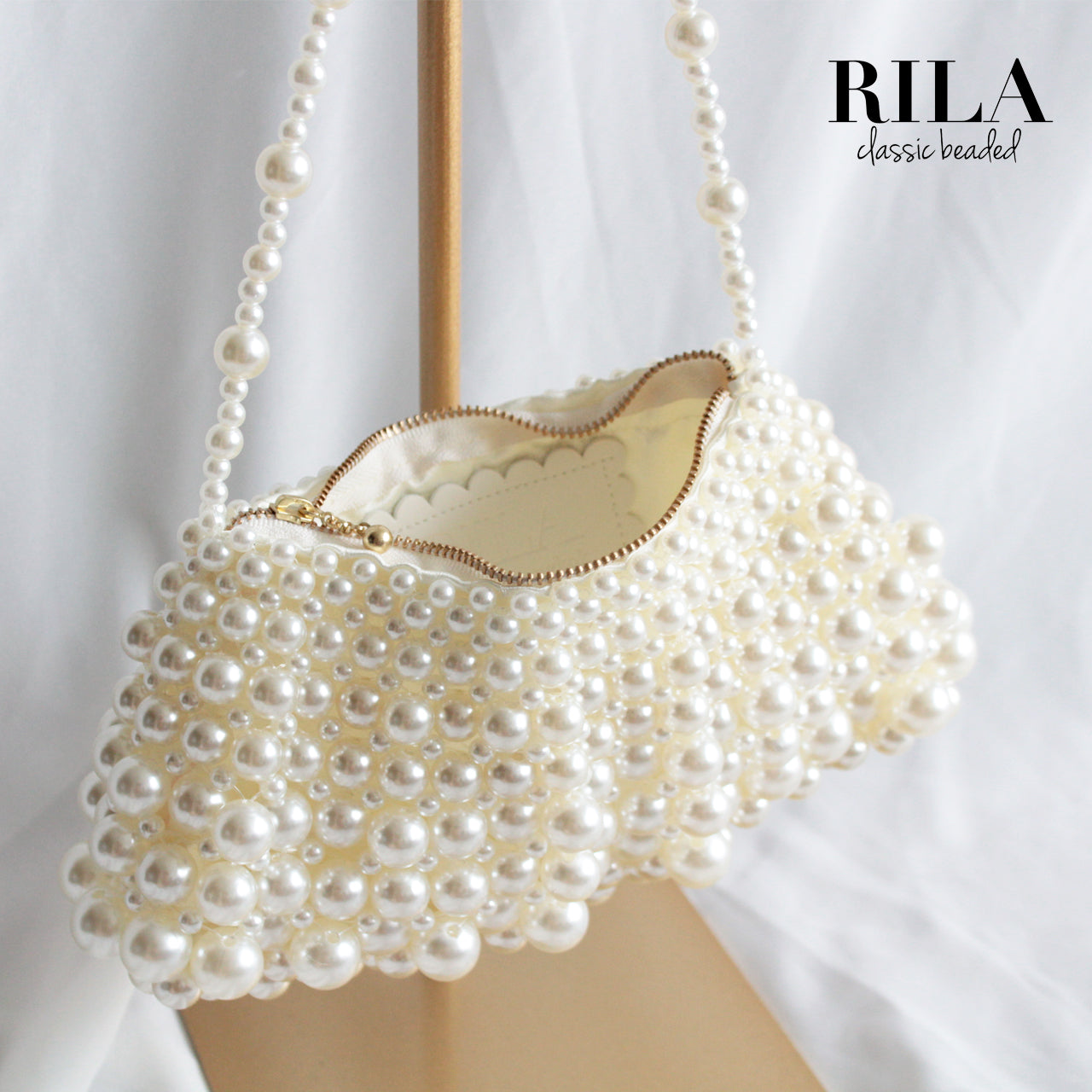 Pearl flap bag