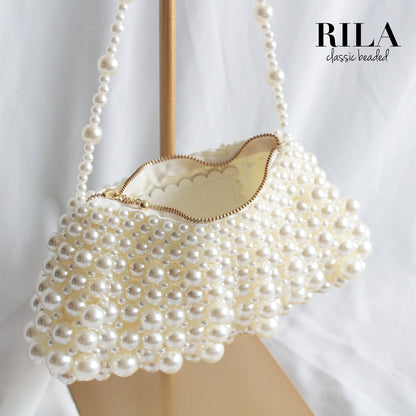 Pearl flap bag