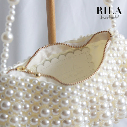 Pearl flap bag