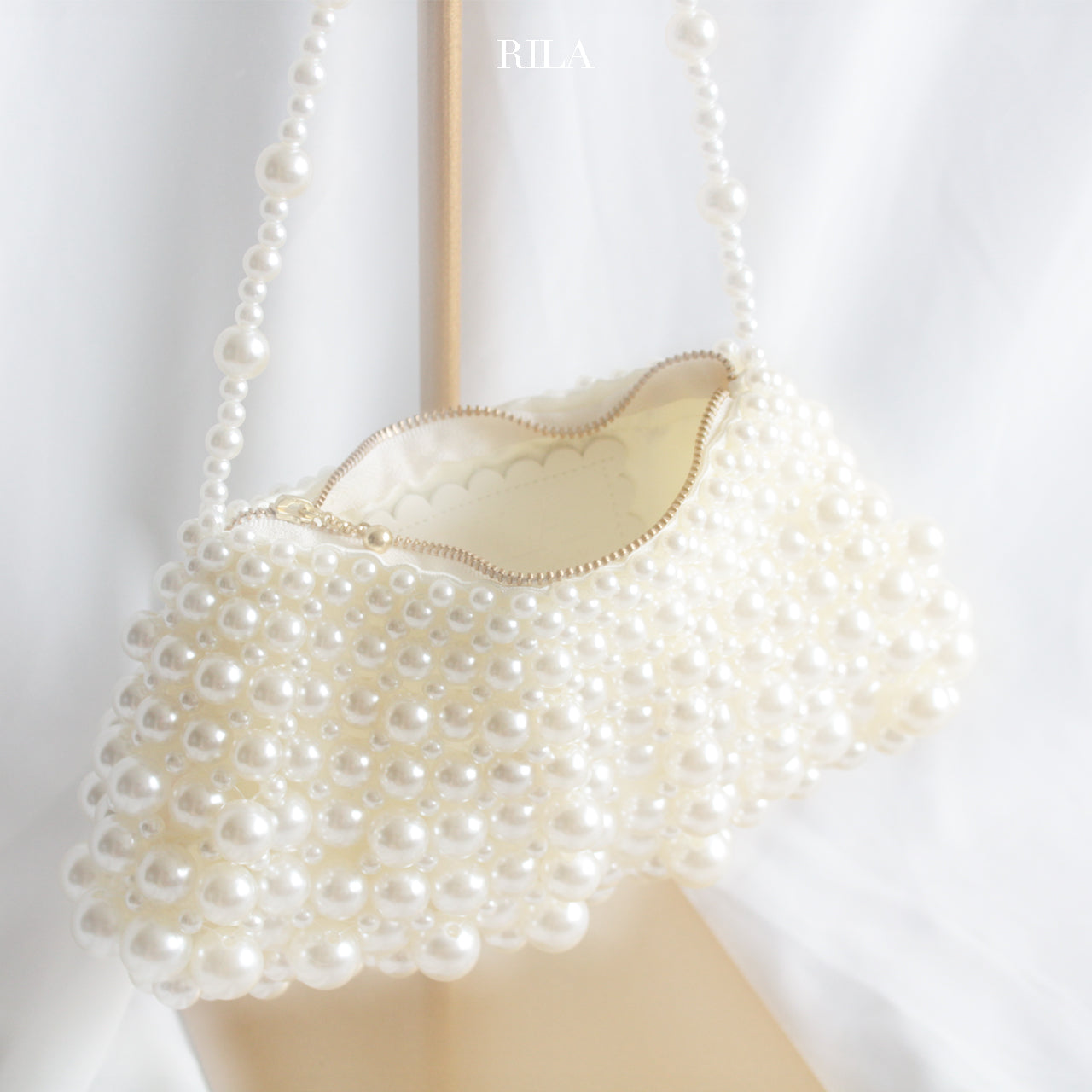 Pearl flap bag